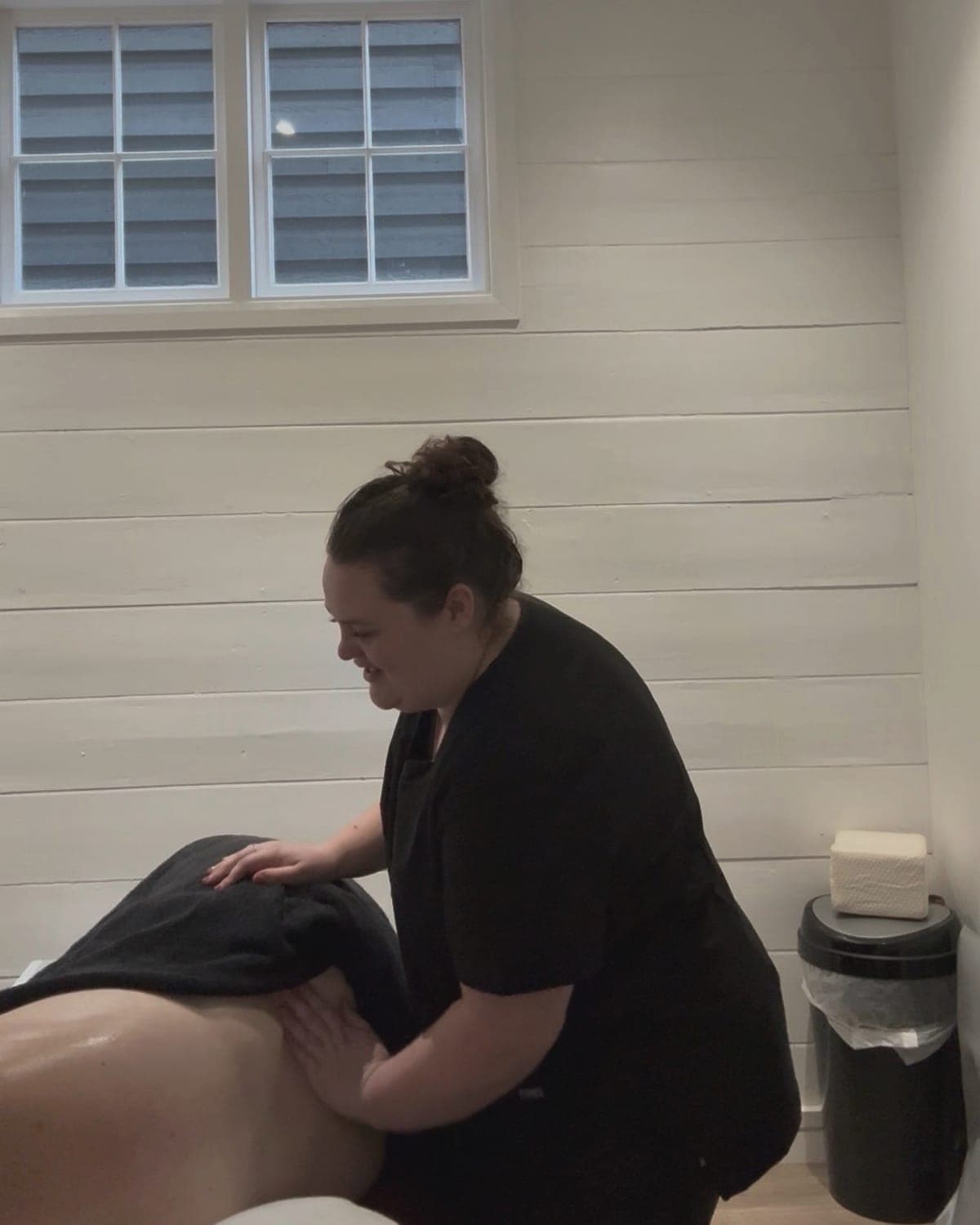 Lois treating a client at her West Malling clinic